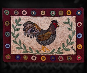 Rooster with Penny Rug Border - 24" x 36" - wool hooked rug suitable for the floor or wall.